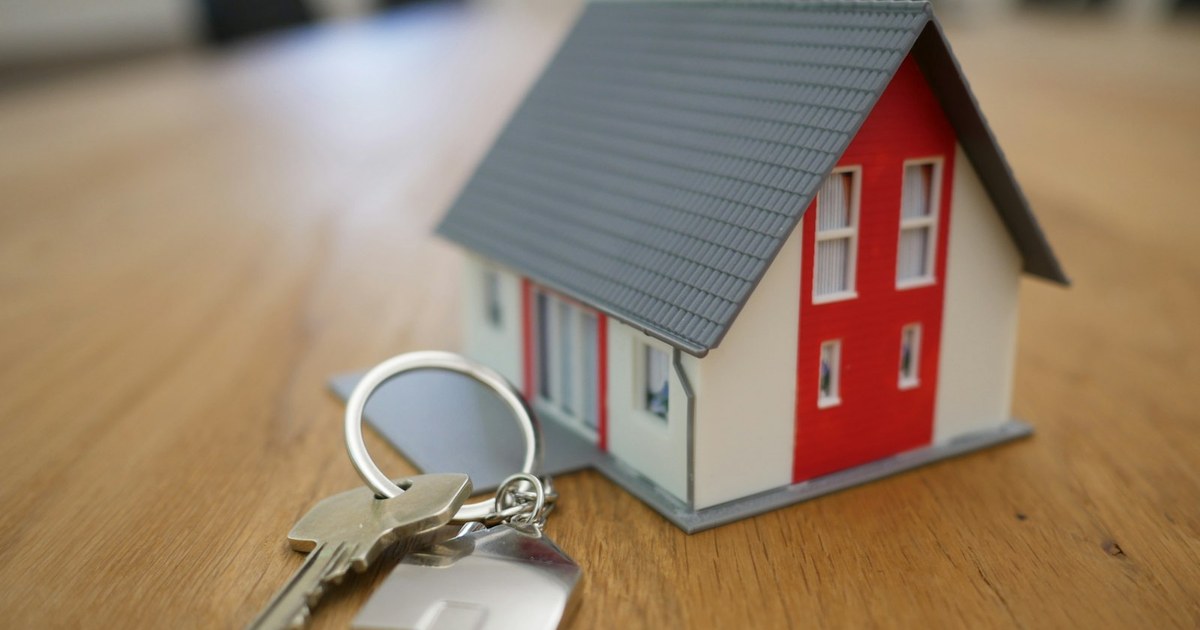 Young couple receiving the keys to their first Bay Area home